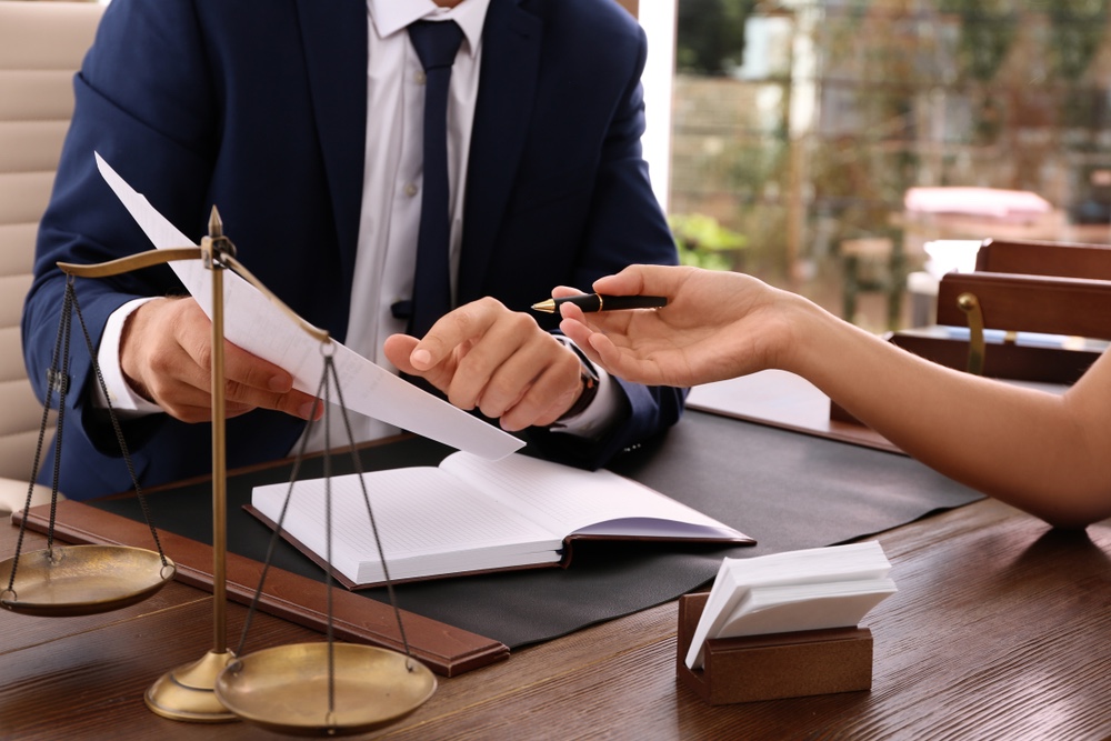 A lawyer providing legal guidance and representation to a sexual assault victim