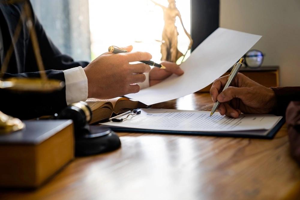 A lawyer reviews a case and consults with a client to determine if receiving stolen property is a felony.